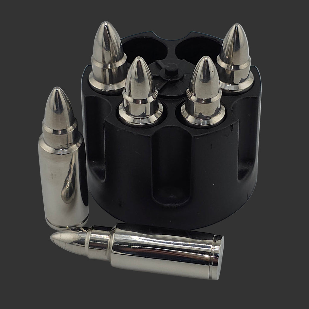 Black holder with silver bullets on a gray background